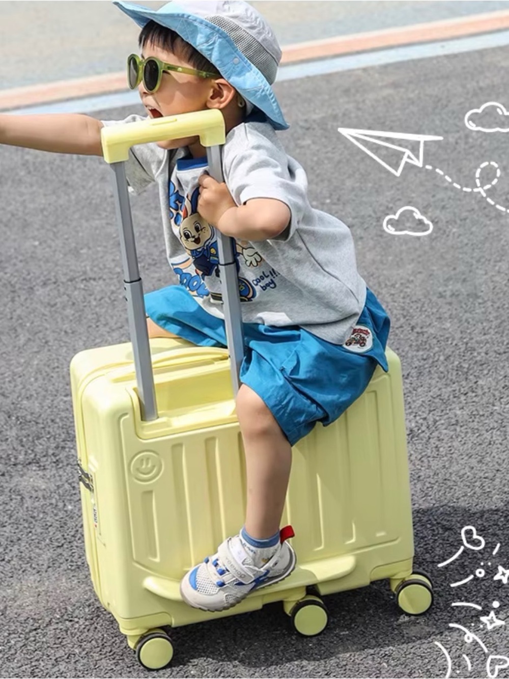 Children's Yellow Ride-On Suitcase with Telescoping Handle